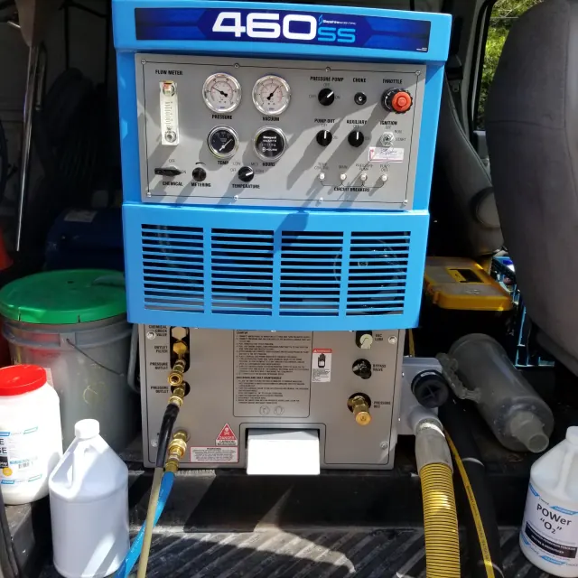 Frank's hot-water extraction unit mounted in the van